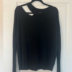 Black long sleeve top with cut out